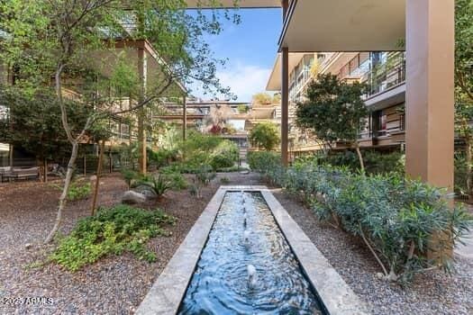 view of property's community with a vegetable garden