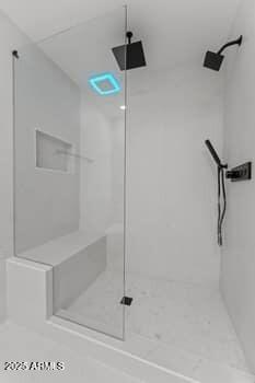 bathroom featuring a stall shower