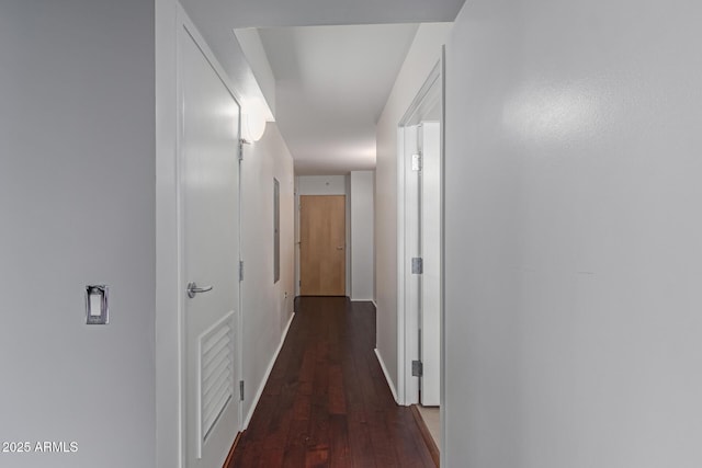 hallway featuring dark hardwood / wood-style flooring