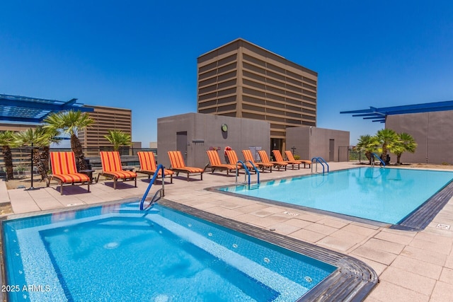 view of pool with a pergola and a patio area