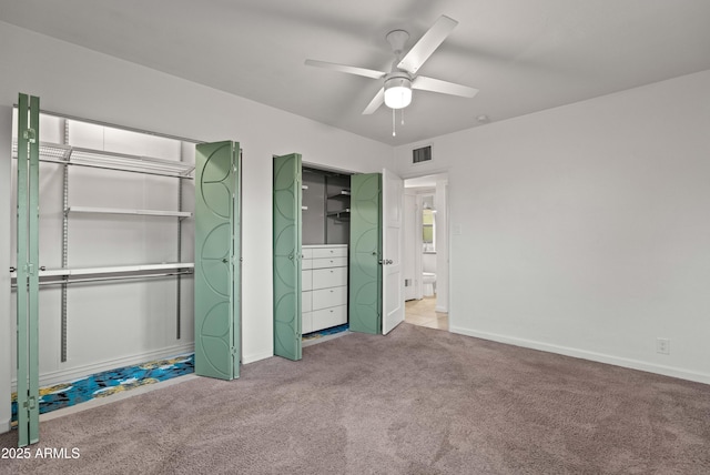 unfurnished bedroom with light carpet and ceiling fan