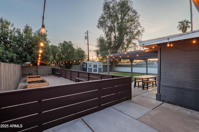 patio terrace at dusk with a storage unit