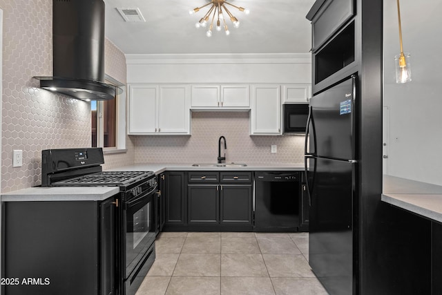 kitchen with pendant lighting, sink, white cabinets, exhaust hood, and black appliances