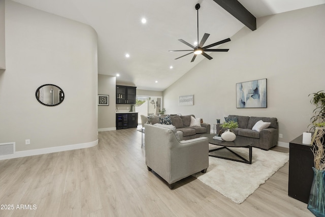 10538 E Gold Dust Cir, Scottsdale, AZ 85258 - living area with light wood-type flooring, a ceiling fan, recessed lighting, beam ceiling, and high vaulted ceiling