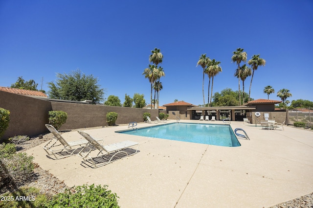 10538 E Gold Dust Cir, Scottsdale, AZ 85258 - community pool featuring a patio
