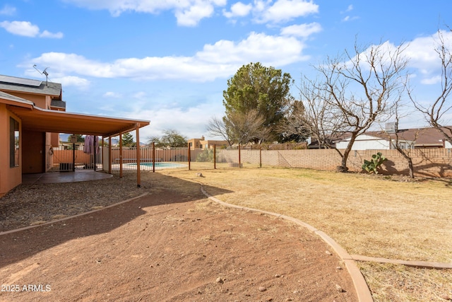 view of yard featuring a patio and a fenced backyard