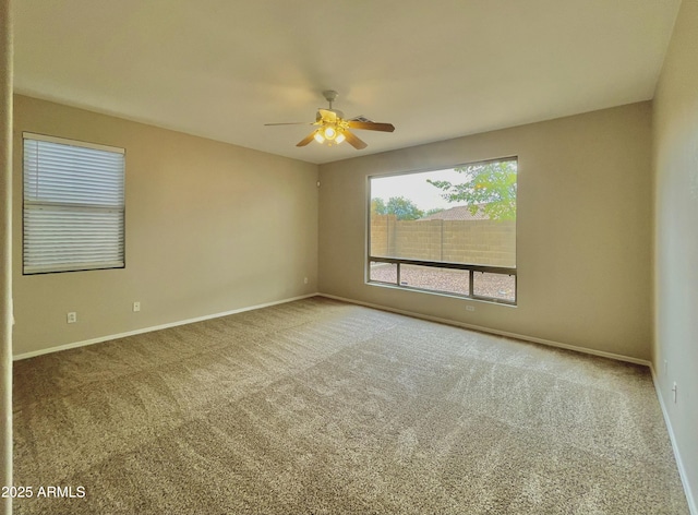 3421 W Warren Dr, Anthem, AZ 85086 - spare room with carpet, baseboards, and ceiling fan