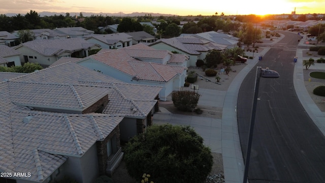 aerial view at dusk with a residential view