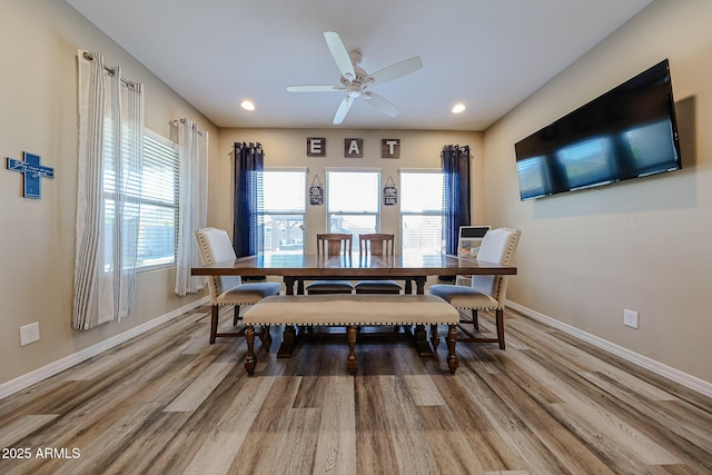 dining space featuring recessed lighting, ceiling fan, baseboards, and wood finished floors