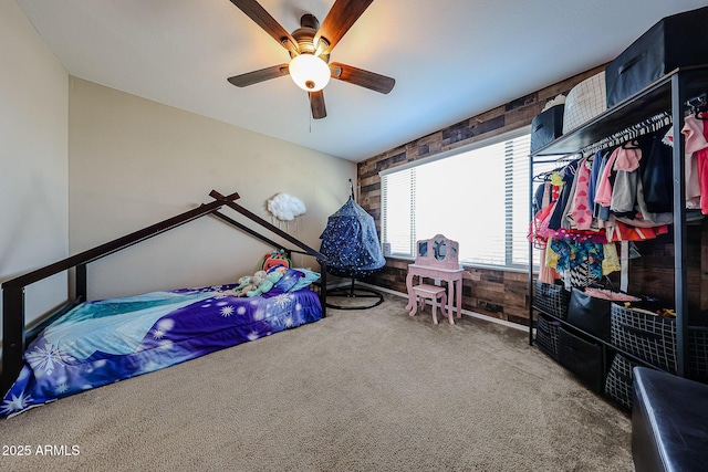 bedroom featuring carpet flooring and a ceiling fan