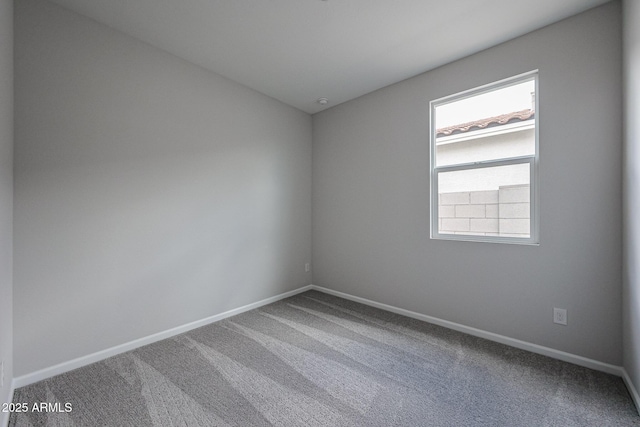 2614 E Music Mountain Ave, Apache Junction, AZ 85119 - carpeted spare room featuring baseboards