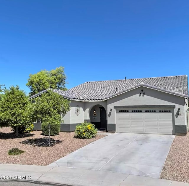 view of front of home with a garage