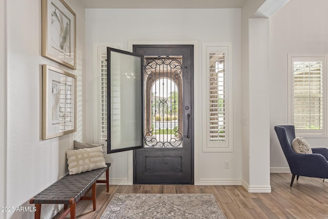 3400 S Whetstone Pl, Chandler, AZ 85286 - foyer entrance with wood finished floors and baseboards