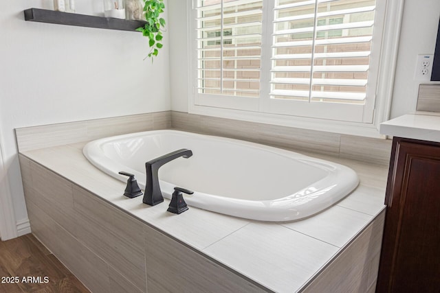 3400 S Whetstone Pl, Chandler, AZ 85286 - bathroom with a bath, vanity, and wood finished floors
