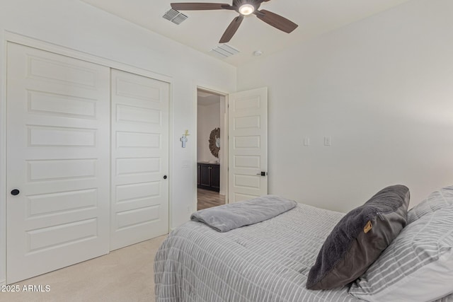 3400 S Whetstone Pl, Chandler, AZ 85286 - bedroom featuring light carpet, a closet, and a ceiling fan
