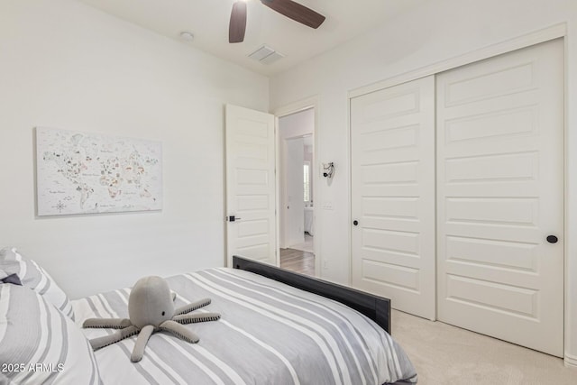 3400 S Whetstone Pl, Chandler, AZ 85286 - bedroom with light carpet, a closet, and a ceiling fan