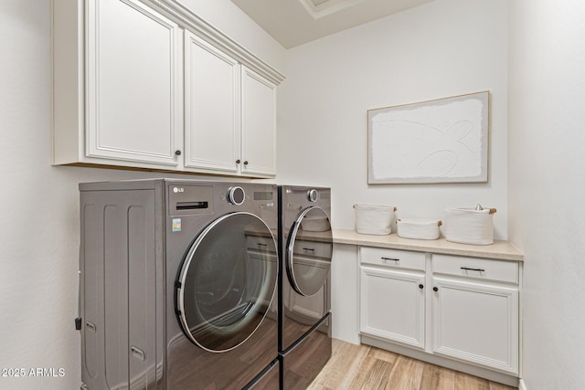 3400 S Whetstone Pl, Chandler, AZ 85286 - laundry room with independent washer and dryer, cabinet space, and light wood-style floors