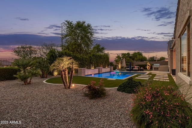 3400 S Whetstone Pl, Chandler, AZ 85286 - pool at dusk with a patio