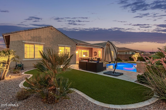 3400 S Whetstone Pl, Chandler, AZ 85286 - rear view of property featuring outdoor lounge area, a patio area, and stucco siding