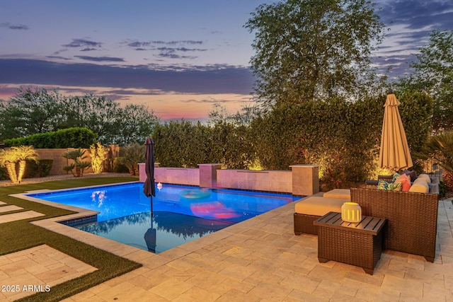 3400 S Whetstone Pl, Chandler, AZ 85286 - pool at dusk featuring a patio area and a fenced backyard