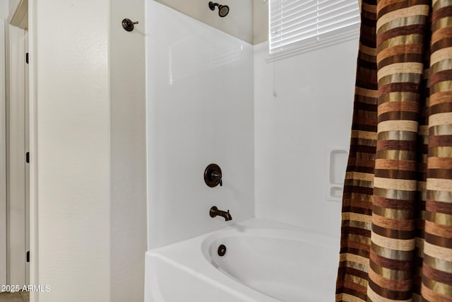 full bathroom with shower / tub combo