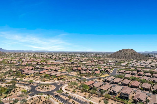 drone / aerial view with a residential view and a mountain view