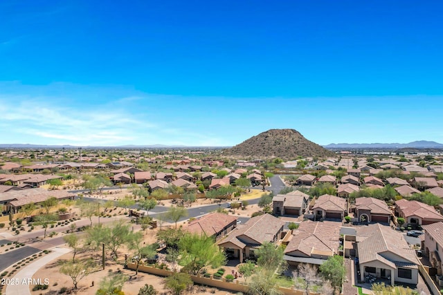 aerial view with a mountain view and a residential view