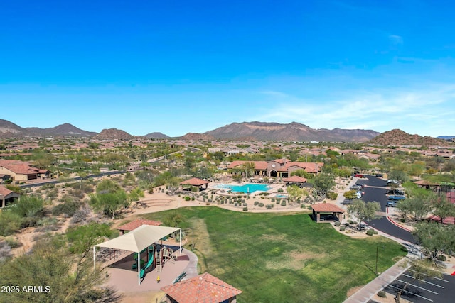 birds eye view of property featuring a mountain view