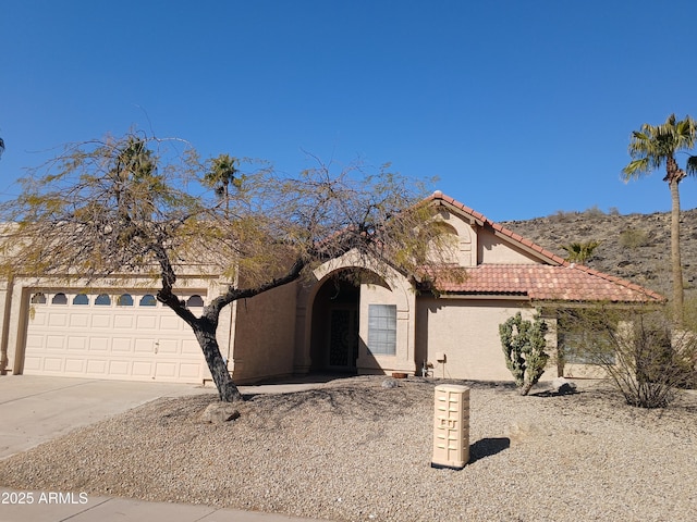 view of front of home with a garage