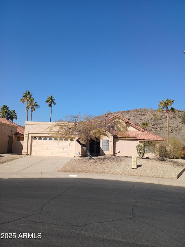 view of front of property featuring a garage