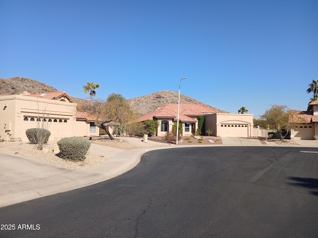 view of front of property with a mountain view