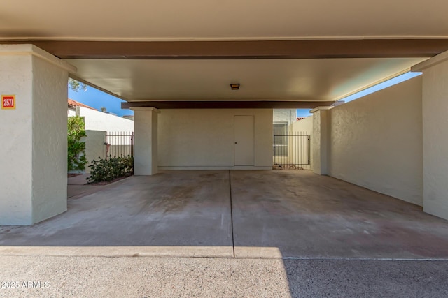 view of patio / terrace featuring a carport