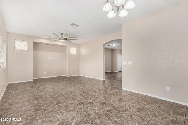 4151 Big Bend St, Sierra Vista, AZ 85650 - empty room with arched walkways, a ceiling fan, a chandelier, and baseboards