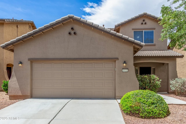 4151 Big Bend St, Sierra Vista, AZ 85650 - mediterranean / spanish home with a garage, a tile roof, driveway, and stucco siding