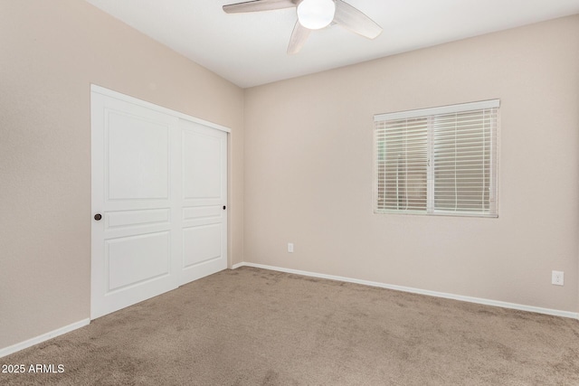 4151 Big Bend St, Sierra Vista, AZ 85650 - unfurnished bedroom with carpet flooring, a closet, baseboards, and a ceiling fan