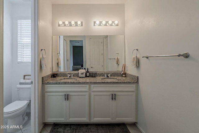 6566 E Via Arroyo Largo, Tucson, AZ 85756 - full bathroom with double vanity and tile patterned floors