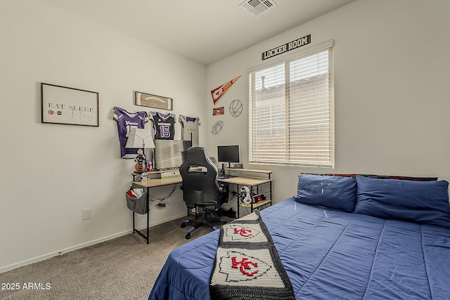 6566 E Via Arroyo Largo, Tucson, AZ 85756 - carpeted bedroom featuring baseboards and a desk
