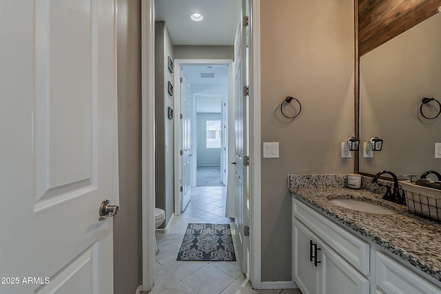 6566 E Via Arroyo Largo, Tucson, AZ 85756 - bathroom with vanity, tile patterned floors, and recessed lighting