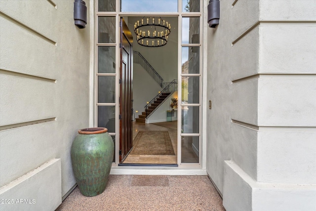 doorway to property with stucco siding