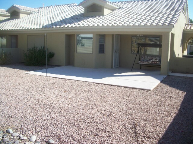 5830 E Mckellips Rd Unit 62, Mesa, AZ 85215 - back of property featuring a tile roof and stucco siding