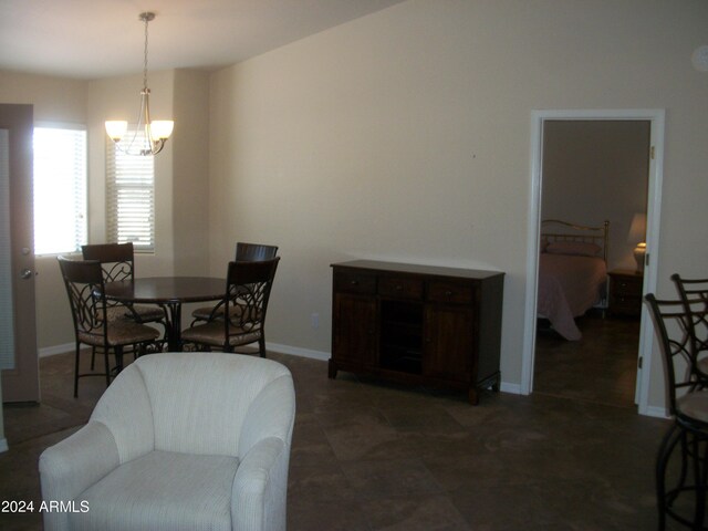 5830 E Mckellips Rd Unit 62, Mesa, AZ 85215 - dining room featuring baseboards and a notable chandelier