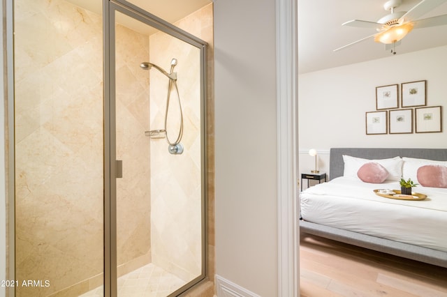 bedroom with wood-type flooring and ceiling fan