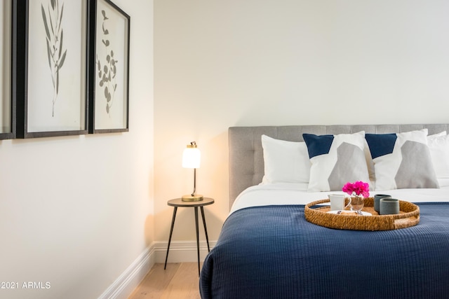 bedroom featuring light hardwood / wood-style flooring