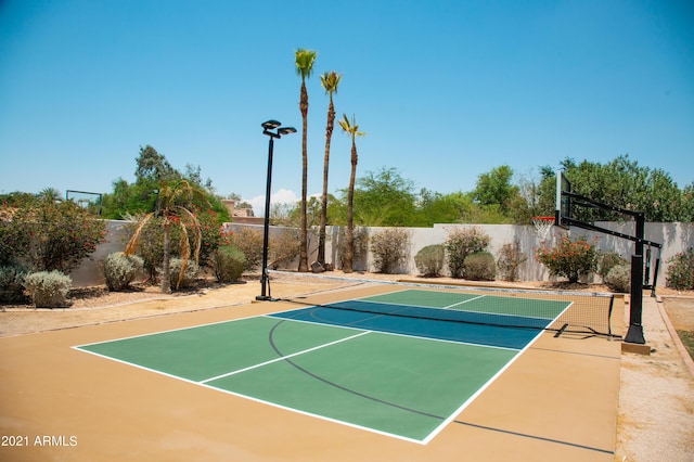 view of sport court with tennis court