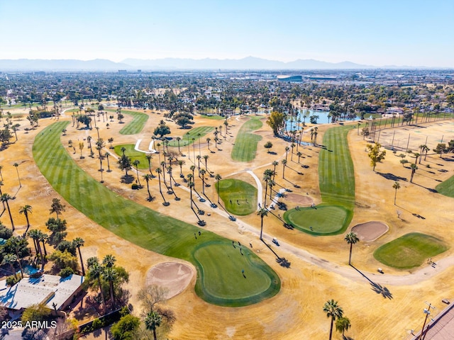 birds eye view of property featuring a water and mountain view