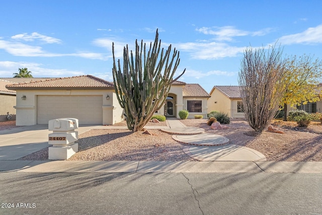 view of front of home with a garage