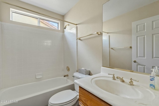 full bathroom with vanity, toilet, and tiled shower / bath combo