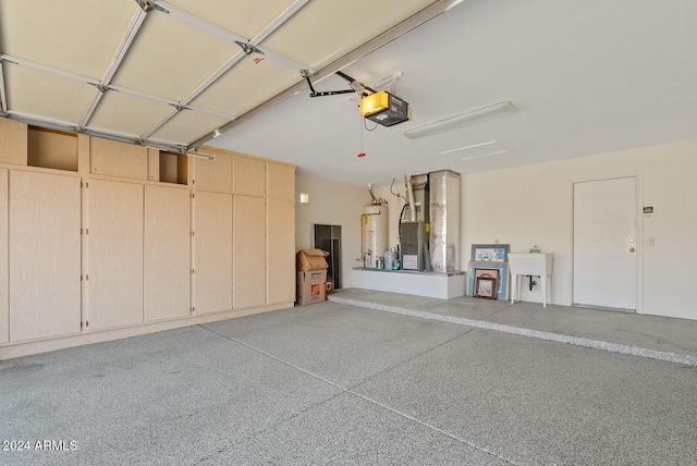 garage featuring heating unit, a garage door opener, and water heater