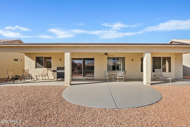 rear view of house featuring a patio and ceiling fan