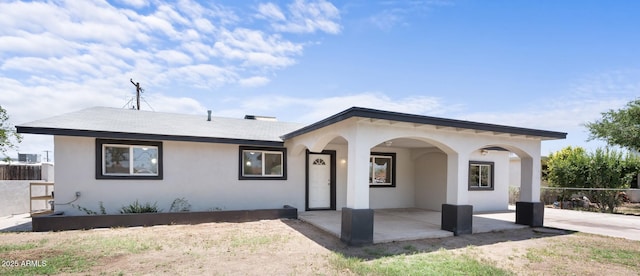 1427 W 6th Dr, Mesa, AZ 85202 - view of front of home with stucco siding and a patio area